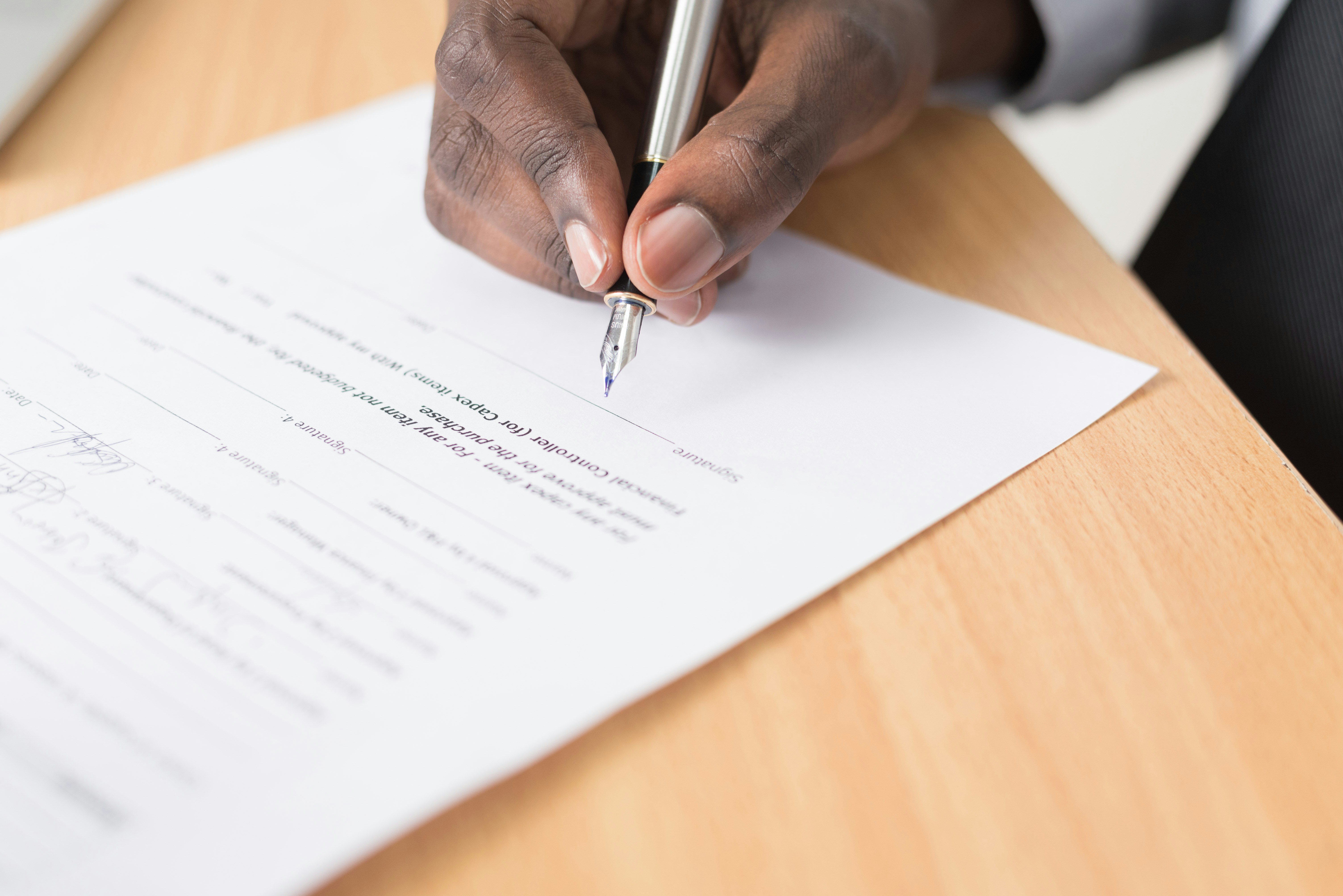 Person reviewing legal documents and contracts